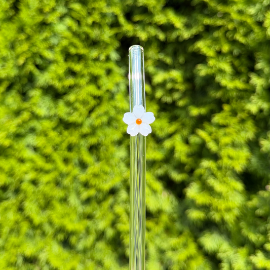 Glassugrör med blomma